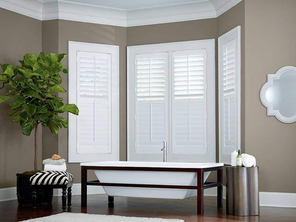 Chic shutters beautifying a bay window.