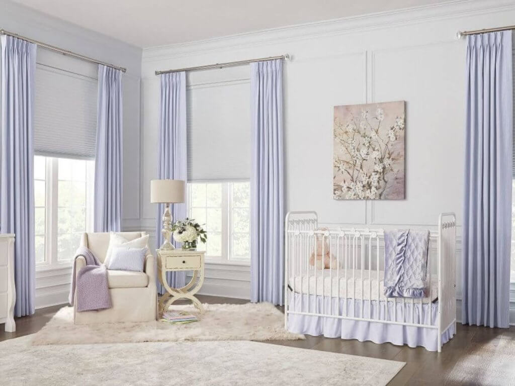 A dark room encourages relaxation, essential for safe sleep and emotional regulation in babies and toddlers. Blackout shades contribute to a sensory-friendly nursery by minimizing visual stimulation.